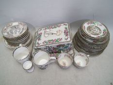 A collection of Indain Tree pattern dinner and tea wares to include Coalport, Minton and other.