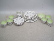 A collection of Foley Bone Chine table wares decorated in the Fern pattern, approximately 27 pieces.