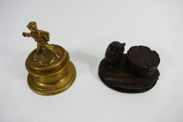 Two inkwells / desk stands comprising a carved wooden example in the form of and owl standing next