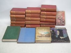 A collection of vintage books to include Charles Dickens, Rudyard Kipling and other.