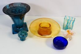 Glassware to include Mdina vase and mushroom paperweight, orange glass centrepiece and other.