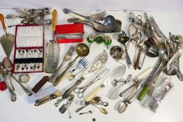 A quantity of plated flatware and similar.