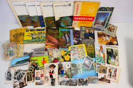 Lot to include postcards, stamps, cigarette cards and similar.