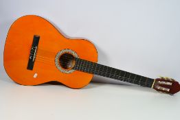An acoustic guitar model CGT303.