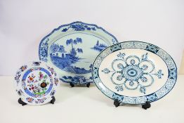 A collection of 18th / 19th century ceramics to include a bue and white meat plate with landscape