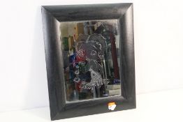 A Betty Boop wall mirror, 42 cm x 34 cm.