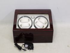 An automatic watch winder for four watch