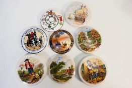 A collection of transfer printed pot lid