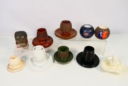 A collection of vintage match holders /
