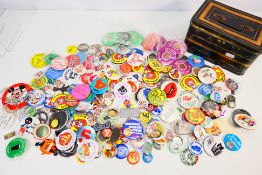 A collection of vintage pin badges. [W]