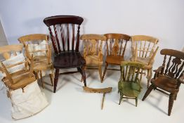 A collection of stickback dolls chairs,