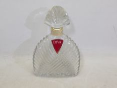 A large glass perfume bottle, approximat