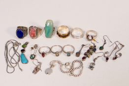 A collection of white metal jewellery to include rings, necklace, bracelet and earrings,