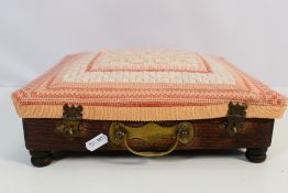 An antique carriage foot warmer.
