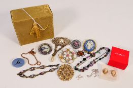A collection of costume jewellery to include bracelets, brooches, necklace and similar.