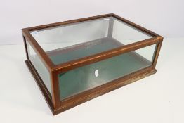 A tabletop mahogany framed five glass display case, approximately 17 cm x 46 cm x 33 cm.
