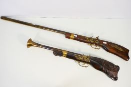 Two replica flintlock type firearms comprising a rifle and blunderbuss. [2].