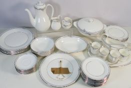 A collection of Royal Doulton dinner and tea wares decorated in the Andante pattern,