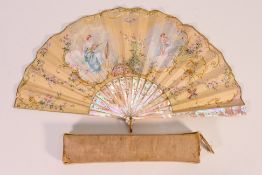 An early 20th century hand painted fan with mother of pearl sticks and guards by R Serand,