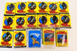 A collection of unopened trade card / bubble gum / sticker packs to include Dick Tracy,