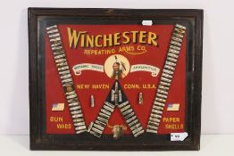 A glazed display for Winchester Repeating Arms Co, approximately 37 cm x 45 cm.