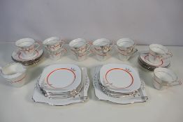 A collection of St Michael China Art Deco style tea wares, approximately thirty eight pieces.