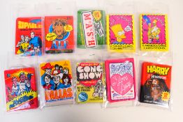 A quantity of unopened television related trade card / bubble gum / sticker packs to include I Love