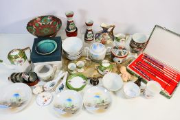 A collection of Oriental items to include two Sake sets, both with five cups, boxed saucers,
