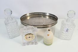 Two cut glass decanters, glass cased clo