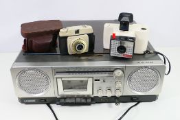 A Ferguson Studio 1000 record player and two cameras.