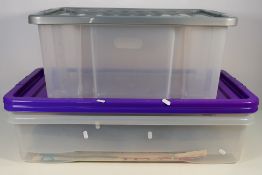 Plastic storage boxes x 3 - Two under bed storage boxes and one other, all with lids,