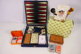 Lot to include a games compendium, playing cards and a boxed Shudehill photograph frame.