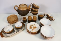 A collection of Denby table wares, to include teapot, cups and saucers, bowls and similar.