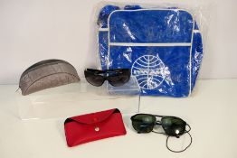 A vintage Pan Am shoulder bag and two pairs of cased sunglasses.