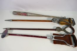 Three vintage shooting sticks and a Bombat baseball bat.