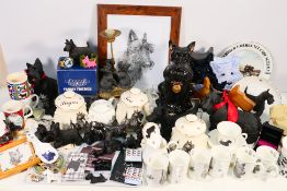 A large quantity of items relating to Scottish terriers to include ceramics, figures, pin badges,