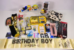 A quantity of Star Wars and Minions related items to include Top Trumps, figures,