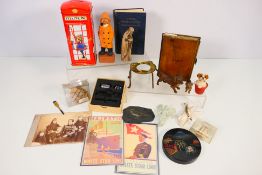A mixed lot to include cold painted metal canine figures, money bank, religious items and other.