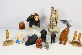 A collection of animal figures, largest approximately 18 cm (h).