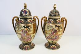 A Pair of lidded Satsuma vases approx 36 cm tall.