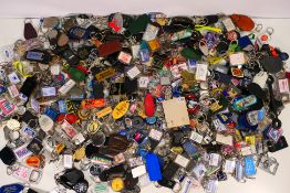 A very large quantity of keyrings, automotive related, advertising and other.