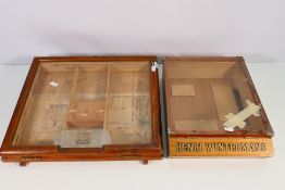 Two counter top cigar display cases including Henri Wintermans,