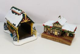 Two Hawthorne Village Christmas decorations comprising Train Station and Covered Bridge,