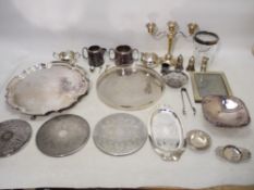 A collection of plated wares to include salver, photograph frame, candelabra and other.
