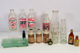 Vintage glass and similar bottles to include advertising examples..