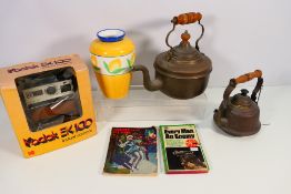 Lot to include vintage brass kettles, boxed Kodak EK100 camera, fruit decorated vase and other.