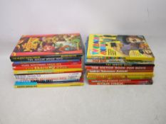 A collection of vintage annuals to include Dr Who, Kojak, Dandy, Beezer, Victor,