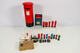 Lot to include a GPO cap badge, quantity of postal pillar box models, GPO punch marks and other.