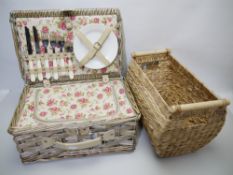 A wicker picnic basket and food basket lot.