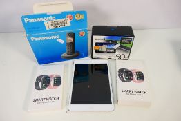 Lot to include a boxed Garmin Sat Nav, Apple iPad, two smart watches (one factory sealed) and other.